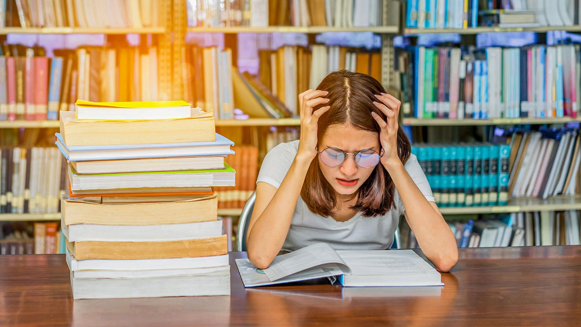 student working on research assignment